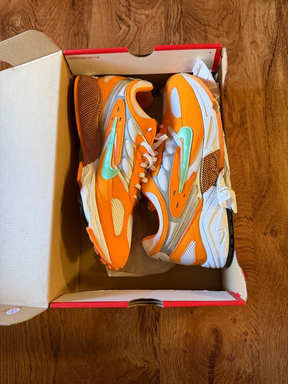 Nike Air Ghost Racer Orange and White Mesh Sneakers with Mint Accent